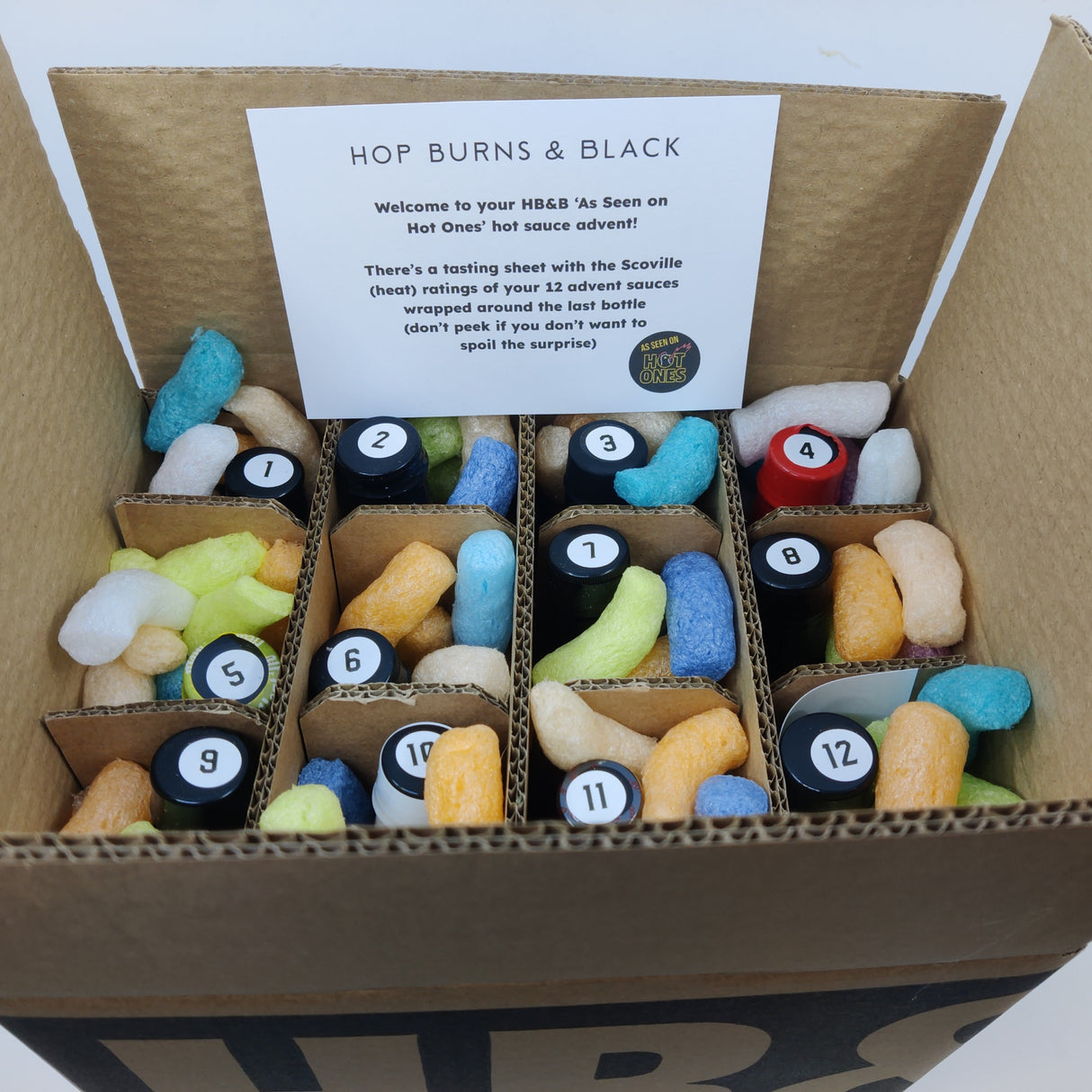 The HB&B 'As Seen on Hot Ones' Hot Sauce Advent 2023 (12 sauces) Hop